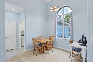 Beautiful tall window facing front of home.  Entry into the kitchen with huge pantry.