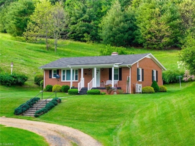 8693 Nc Highway 88 E, Laurel Springs, NC 28644 - photo 2