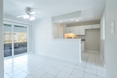 Another angle of dining room showing sliding glass