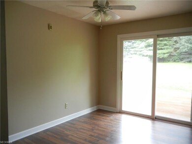 Open dinette area in Kitchen with slider leading t