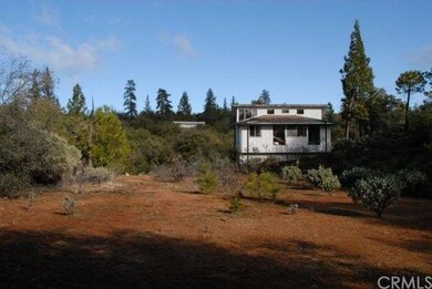 Day-cottage at the opposite end of sunny parcel. (