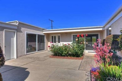 Enter This Home Through Your Own Court Yard.