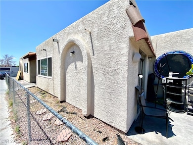 View of property exterior featuring stucco siding