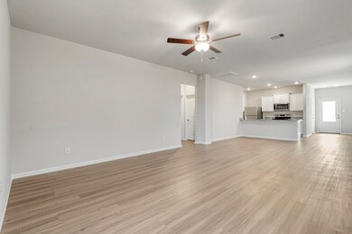 The open concept in the living room offers plenty
