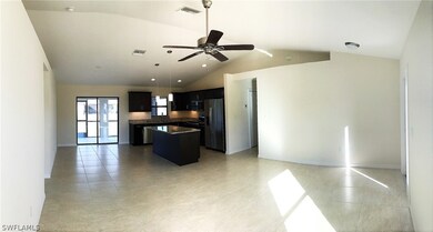 DINING ROOM WITH SLIDING GLASS DOORS OUT TO SCREEN