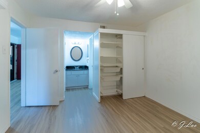 Unfurnished bedroom featuring wood finished floors