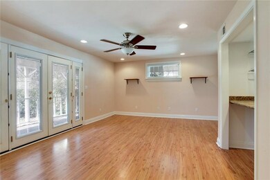 Spacious Den overlooking covered porch