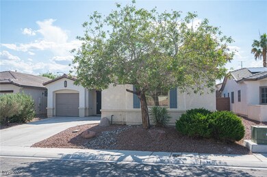 View of front of property featuring a garage, conc