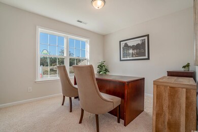 View of carpeted home office