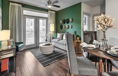Living room with dark hardwood / wood-style floors