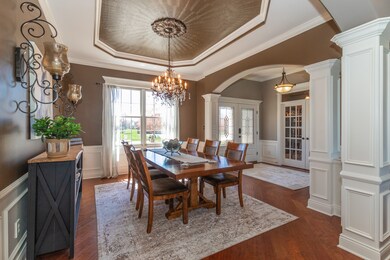 The Dining Room has Decorative Ceiling and Hardwood Floors