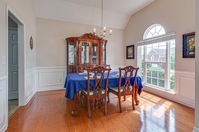 To the right of the entry is the formal dining room.  Notice the classic wainscot detail on the wall! 