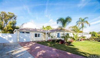 Charming front exterior with deep driveway, RV par