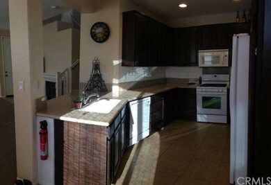 Open kitchen with granite counter tops, 5 burner g