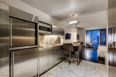 Kitchen with appliances with stainless steel finis