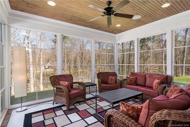 Seasonal enclosed patio.  E-Z Breeze system allows
