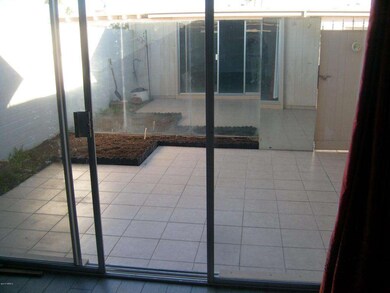 Tiled patio with planting area