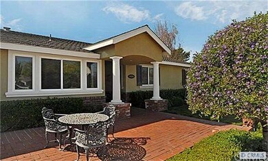 BRICK PATIO  WITH  DRAMATIC ENTRY