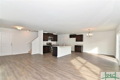Foyer, kitchen and dining area view from living ro