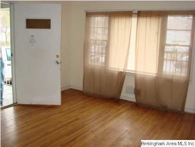 Front door on left leads to living room with nice 