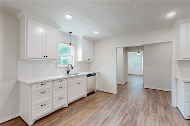 Cute country kitchen with a large farm house sink and window above!