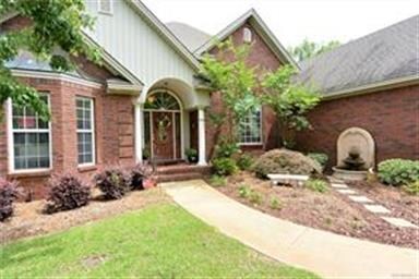 BEAUTIFULLY LANDSCAPED YARD WITH UNDERGROUND SPRIN