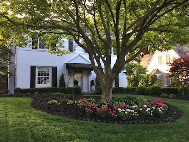 Summer photo of front yard.