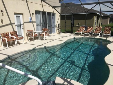 939 Andalusia Loop, Davenport, FL 33837 - photo 2