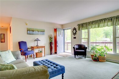 Huge picture window in Living room. Coat closet by