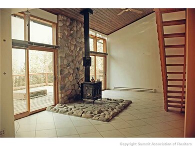 Living Room. Wood Burning Stove is the Focal Point