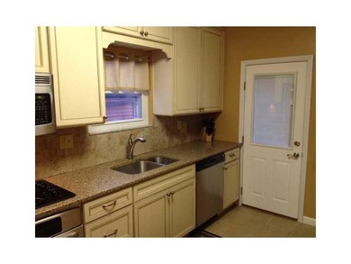 Kitchen. Gorgeous Kraftmaid cabinetry boasts the g