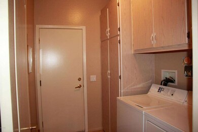 INSIDE LAUNDRY WITH STORAGE
