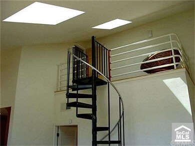 The spiral staircase provide access to the loft ar