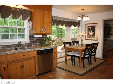 Kitchen - A walk-out bay window provides ample spa