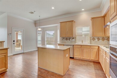 Wonderful kitcjen with an Island and cabinetery.