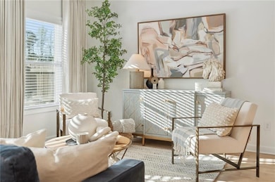 Sitting room with wood finished floors