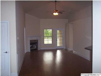 Family room with fireplace, Upgrades/selections are available. Standard is Beautiful Naffco tile in wet areas, v lock in foyer and quality carpet throughout. Upgrades are available.