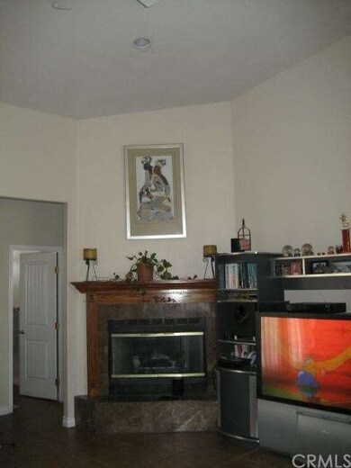 Family Room with fireplace, mantel and cathedral c