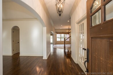 Gleaming hardwood floors greet you in the entry.
