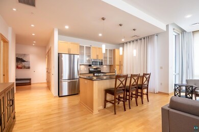 Kitchen featuring stainless steel appliances, ligh
