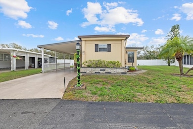 Front view with carport