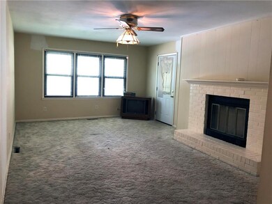 With a little TLC, this living room could be great