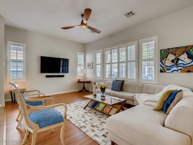 Living room with a wealth of natural light, visibl