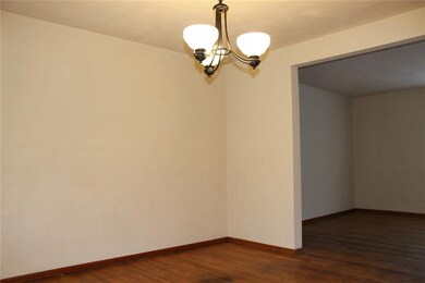 DINING ROOM WITH SLIDING GLASS DOOR TO DECK.