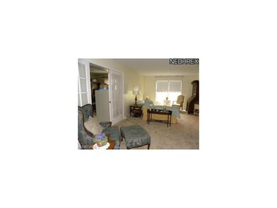 Open Living Room w/New Carpet & Paint. French Door