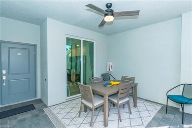 Dining room with a ceiling fan and a textured ceiling