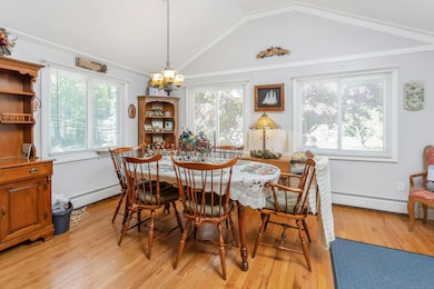 Bright Dining Area with Vaulted Ceiling
