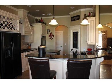 Kitchen. lARGE BREAKFAST BAR, WALK-IN PANTRY WITH 