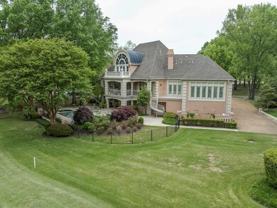 This exquisite home is nestled on a premium lot wi