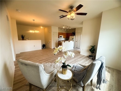Living area featuring light wood finished floors,